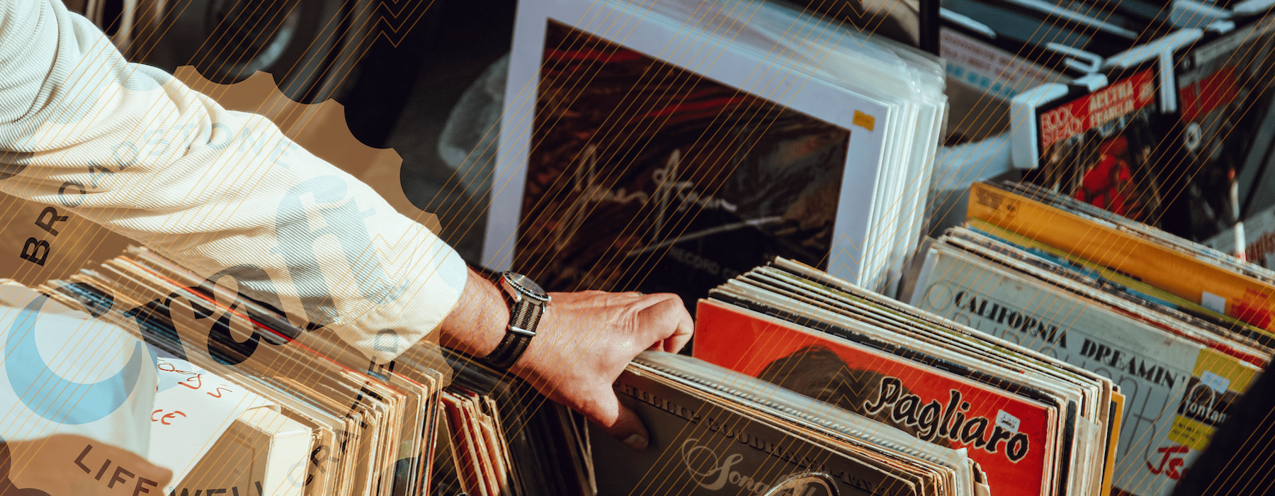 lifestyle image of a person reaching down to look at records 