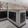 The mail room at Broadstone Craft apartments for rent in Charlotte, NC, featuring black metal mail boxes.
